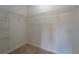 Large walk-in closet with wire shelving for storage at 1067 Haines Dr, Winter Haven, FL 33881