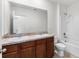 Bathroom with double sinks and a tub shower combo at 113 Eagleview Loop, Davenport, FL 33837