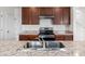 Kitchen with stainless steel sink and range at 113 Eagleview Loop, Davenport, FL 33837