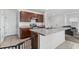 Kitchen with island and access to living room at 113 Eagleview Loop, Davenport, FL 33837