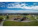 Community playground with playset and benches at 113 Eagleview Loop, Davenport, FL 33837