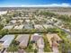 Aerial view of a residential neighborhood with various houses at 119 Verona Dr, Kissimmee, FL 34759