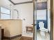 Clean bathroom with a walk in shower, pebble flooring and a toilet at 119 Verona Dr, Kissimmee, FL 34759