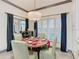 Bright dining area with a round table and window seating at 119 Verona Dr, Kissimmee, FL 34759