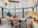 Sunroom dining area with charming table and whimsical decor at 119 Verona Dr, Kissimmee, FL 34759