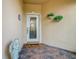 Front entry with decorative door and welcoming mat at 119 Verona Dr, Kissimmee, FL 34759