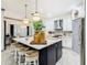 Modern kitchen with a large island and stainless steel appliances at 119 Verona Dr, Kissimmee, FL 34759