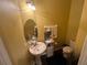 Small bathroom with toilet and single vanity at 1427 Pacific Rd, Kissimmee, FL 34759