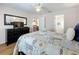 Bedroom with large mirror and a view into the living room at 154 Robin Rd, Davenport, FL 33896