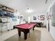 Game room featuring a pool table and air hockey at 154 Robin Rd, Davenport, FL 33896