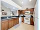 Well-equipped kitchen featuring ample cabinetry and modern appliances at 154 Robin Rd, Davenport, FL 33896