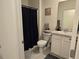 Clean bathroom with toilet, shower, and vanity at 1657 Rosydale Cir, Davenport, FL 33837