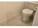 Small bathroom with toilet and tile floor at 1657 Rosydale Cir, Davenport, FL 33837