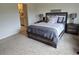 Cozy bedroom with a comfortable bed and nightstands at 1657 Rosydale Cir, Davenport, FL 33837