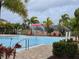 Refreshing community pool with water features at 1657 Rosydale Cir, Davenport, FL 33837