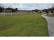 Community soccer field with goals and walking path at 1657 Rosydale Cir, Davenport, FL 33837