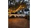 Backyard at night with string lights at 1808 S Mulberry Ave, Sanford, FL 32771
