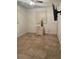 Spacious bedroom featuring tile floors and a mounted TV at 1808 S Mulberry Ave, Sanford, FL 32771