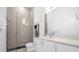 Clean bathroom with a walk-in shower and modern vanity at 2137 Pine Oak Loop, Davenport, FL 33837