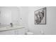 Simple bathroom with a toilet and modern vanity at 2137 Pine Oak Loop, Davenport, FL 33837