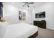 Comfortable bedroom with a king-size bed, TV, and artwork at 2137 Pine Oak Loop, Davenport, FL 33837