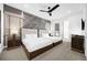 Spacious bedroom with two beds, nightstands, and modern decor at 2137 Pine Oak Loop, Davenport, FL 33837