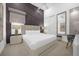 Bright bedroom with a king-size bed and modern nightstands at 2137 Pine Oak Loop, Davenport, FL 33837