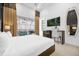 Bright bedroom with a comfortable bed and backyard access at 2137 Pine Oak Loop, Davenport, FL 33837