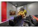Theater room with multiple seats and large screen at 2137 Pine Oak Loop, Davenport, FL 33837