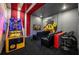 Game room featuring arcade games and theater seating at 2137 Pine Oak Loop, Davenport, FL 33837
