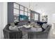 Bright, open Gathering room with large TV and ample seating at 2137 Pine Oak Loop, Davenport, FL 33837