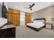 Spacious main bedroom with large bed and stylish decor at 2137 Pine Oak Loop, Davenport, FL 33837