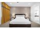Bright main bedroom featuring a king-size bed and ensuite bathroom at 2137 Pine Oak Loop, Davenport, FL 33837