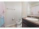 Bathroom with toilet, sink, and shower/tub combo at 2220 Betsy Ross Ln # C, St Cloud, FL 34769