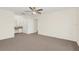 Bedroom with carpet, ceiling fan and ensuite bathroom at 2317 Prime Cir # B, Kissimmee, FL 34746