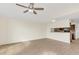 Open concept living room and kitchen at 2317 Prime Cir # B, Kissimmee, FL 34746