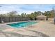 Community pool with lounge chairs and gazebo at 2317 Prime Cir # B, Kissimmee, FL 34746
