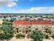 Aerial view of townhomes with red tile roofs at 2380 Bella Vista Dr, Davenport, FL 33897