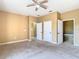 Spacious bedroom with carpet and ceiling fan at 2380 Bella Vista Dr, Davenport, FL 33897