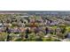 An aerial view pinpoints the location of a charming home in a lush community at 2615 Pawnall St, Kissimmee, FL 34747