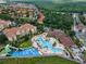 Aerial view of a community pool and water park; a Gathering-friendly amenity at 2615 Pawnall St, Kissimmee, FL 34747