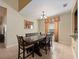 Formal dining room with tile flooring and a chandelier at 2615 Pawnall St, Kissimmee, FL 34747