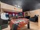 Spacious game room with foosball table, arcade games, movie theater, and seating at 2615 Pawnall St, Kissimmee, FL 34747