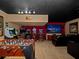 Entertainment room with foosball, arcade games, and a home theater setup for ultimate fun at 2615 Pawnall St, Kissimmee, FL 34747