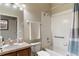 Clean bathroom with shower/tub combo, vanity, and tile flooring at 3001 Laurel Park Ln # 304, Kissimmee, FL 34741