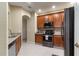 Modern kitchen with stainless steel appliances and granite countertops at 3001 Laurel Park Ln # 304, Kissimmee, FL 34741