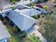 Aerial view showing house, driveway, landscaping, and pool at 31 Augusta Cir, St Cloud, FL 34769