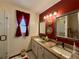 Elegant bathroom with double vanity and large walk-in shower at 31 Augusta Cir, St Cloud, FL 34769