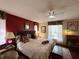 Relaxing main bedroom with comfortable bedding and large windows at 31 Augusta Cir, St Cloud, FL 34769