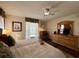 Spacious bedroom with dresser and large bed at 31 Augusta Cir, St Cloud, FL 34769